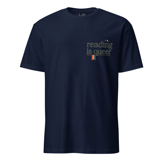 Reading is Queer unisex pride tee in navy with retro 'reading is queer' lettering and rainbow accent