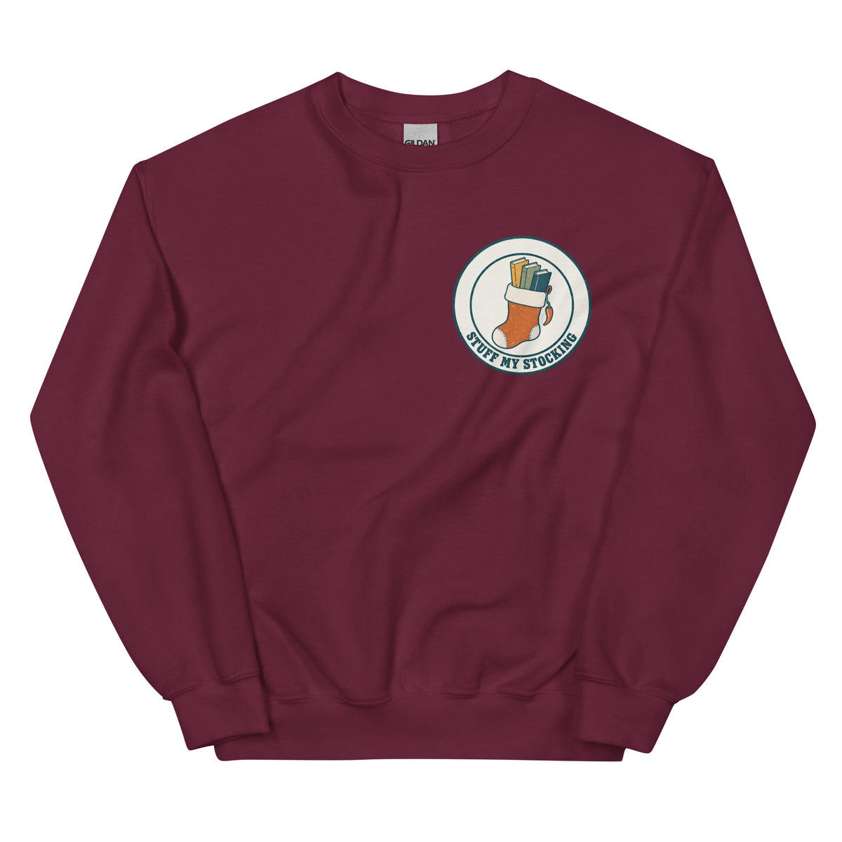 Stuff My Stocking unisex crewneck in maroon with a Christmas stocking full of books and a chili pepper charm